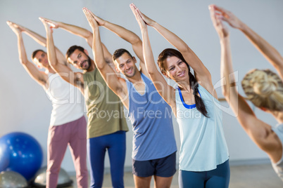 Instructor taking yoga class