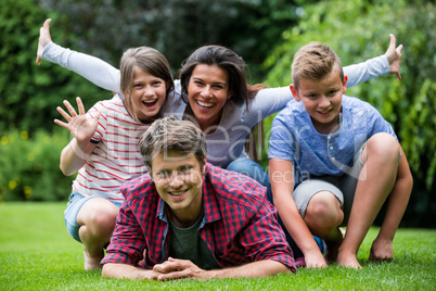 Happy family smiling in park