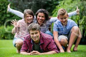 Happy family smiling in park