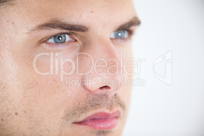 Close-up of man wearing contact lens