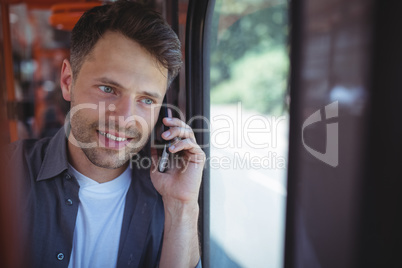 Handsome man talking on mobile phone