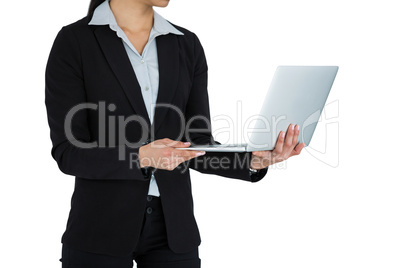 Businesswoman using laptop