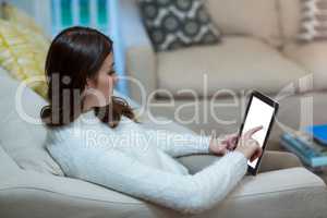 Woman using digital tablet