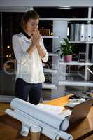 Frustrated businesswoman working in office