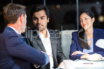 Businessman shaking hands with a colleague