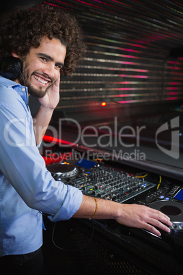 Male DJ playing music