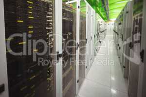 Hallway with a row of servers