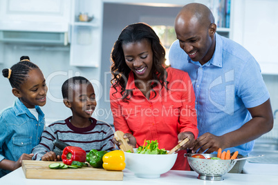 Happy family preparing food