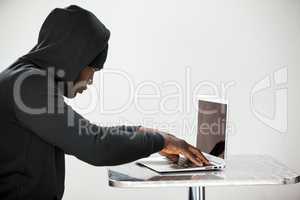Hacker using a laptop