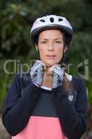 Female biker wearing bicycle helmet