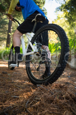 Male mountain biker riding bicycle