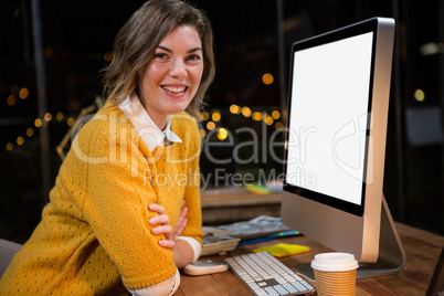 Businesswoman sitting at her desk Businesswoman sitting at her desk
