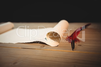 Old blank scroll paper and quill