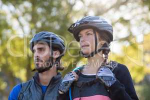 Biker couple standing together