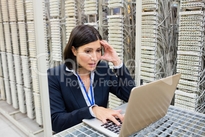 Technician using laptop