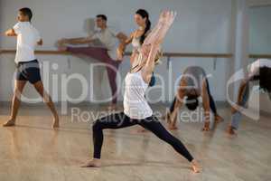 Woman performing stretching exercise