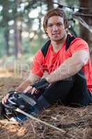 Portrait of male mountain biker in the forest