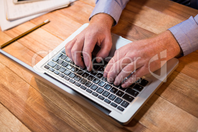 Businessman working on laptop