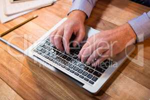 Businessman working on laptop