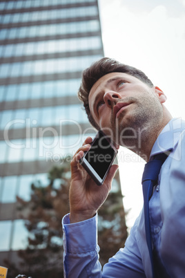 Businessman talking on mobile phone