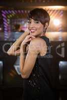 Young woman dancing on dance floor