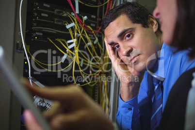 Technician getting bored while analyzing server