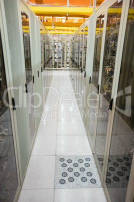 Hallway with a row of servers