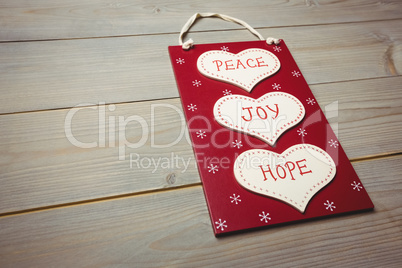 Christmas label with massages of peace, joy and hope