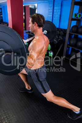 Male athlete holding barbell