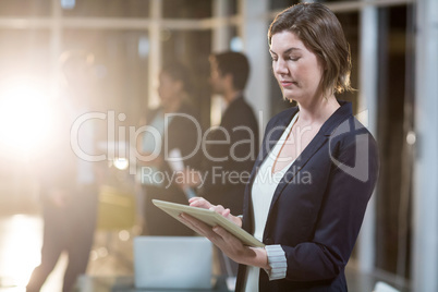 Businesswoman using digital tablet