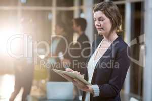 Businesswoman using digital tablet