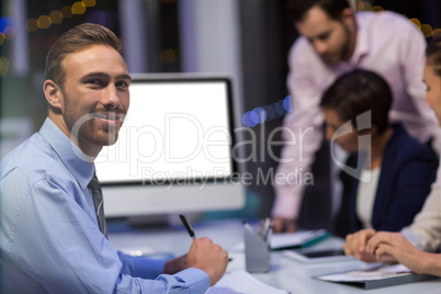 Portrait of businessman in conference room