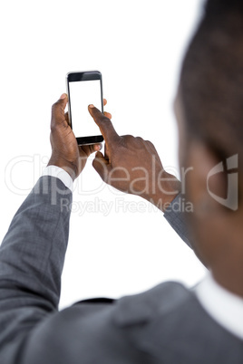 Close-up of businessman using mobile phone