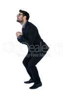 Businessman performing exercise