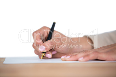 Mid section of businesswoman filling mortgage contract form