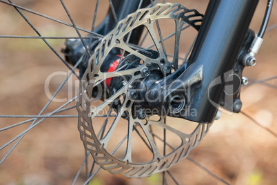 Close-up of mountain bike front wheel