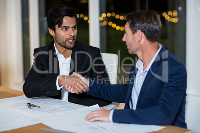 Businessmen shaking hands with each other