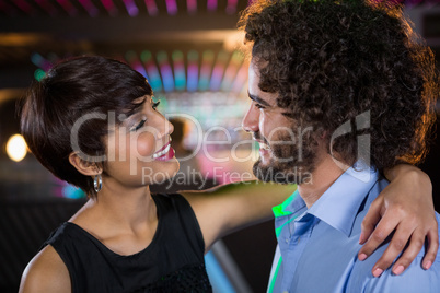 Romantic couple dancing together on dance floor