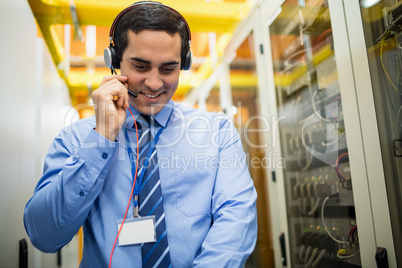 Technician talking on head phones