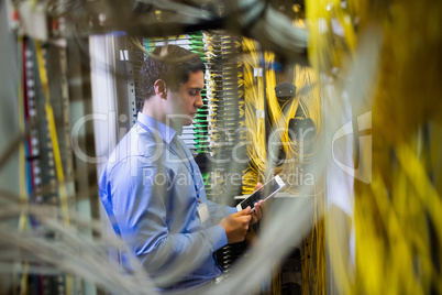 Technician using digital tablet