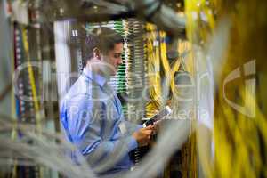 Technician using digital tablet