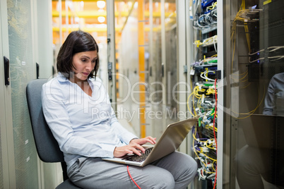 Technician working on laptop