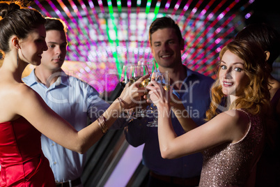 Group of friends toasting glasses of champagne Group of friends toasting glasses of champagne