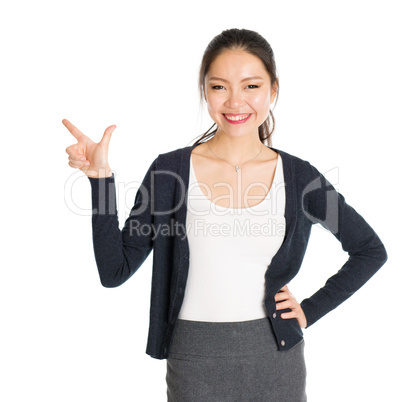Young Asian female pointing