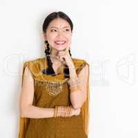 Mixed race Indian woman thinking