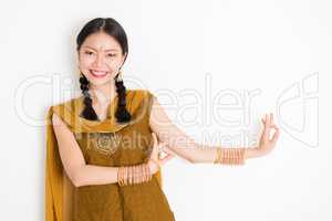 Mixed race Indian woman dancing