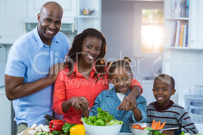 Happy family preparing food