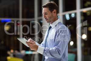 Businessman using digital tablet