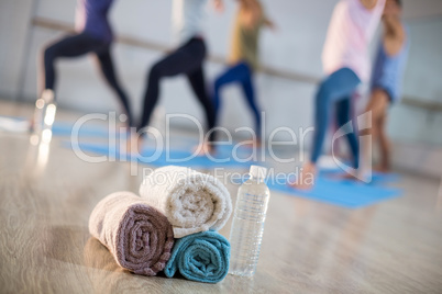 Close-up of towel and water bottle