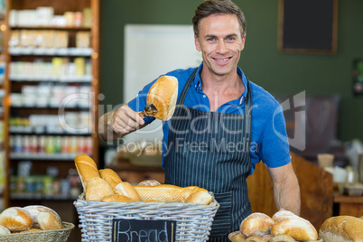 Portrait of male staff working at bakery store